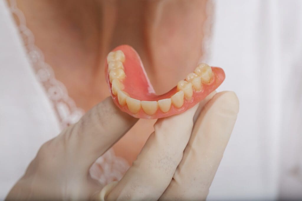 Implant-Supported Dentures vs. Traditional Dentures